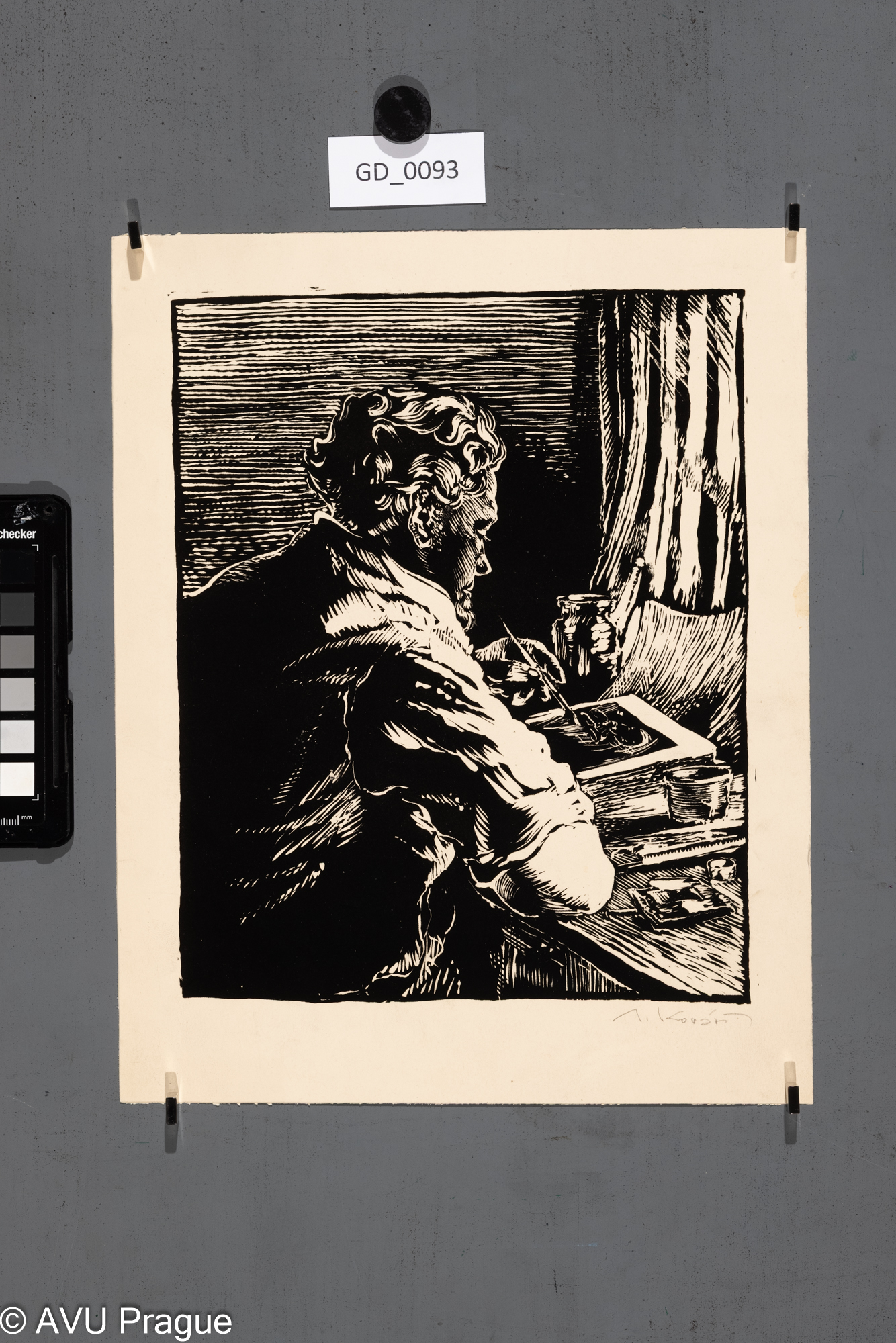 Litograf kreslící na kámen